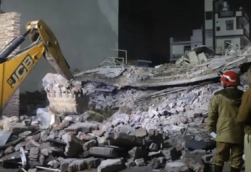 Rescue Operations Underway as Firefighters Reach Trapped Individuals in Burari Building Collapse Debris.