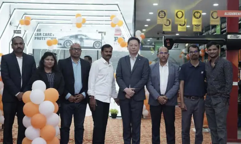 The experienced tire making company is improving its business new premium The experienced tire-making company is improving its business; new premium stores have opened in this city.