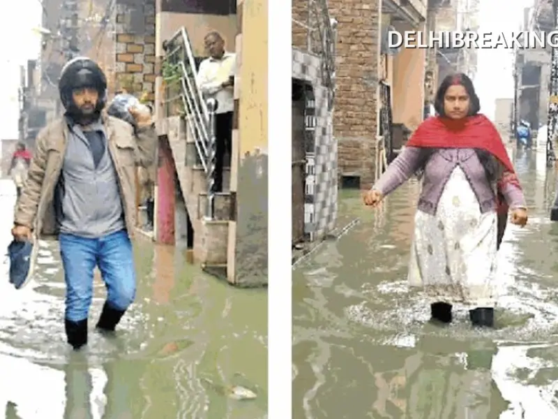 delhibreakings kirari sharma colony waterlogging delhi heavy rain impact Kirari Sharma Colony Drowns in 3 Feet Dirty Water, Kids Miss School as Sewer Water Enters Bedrooms